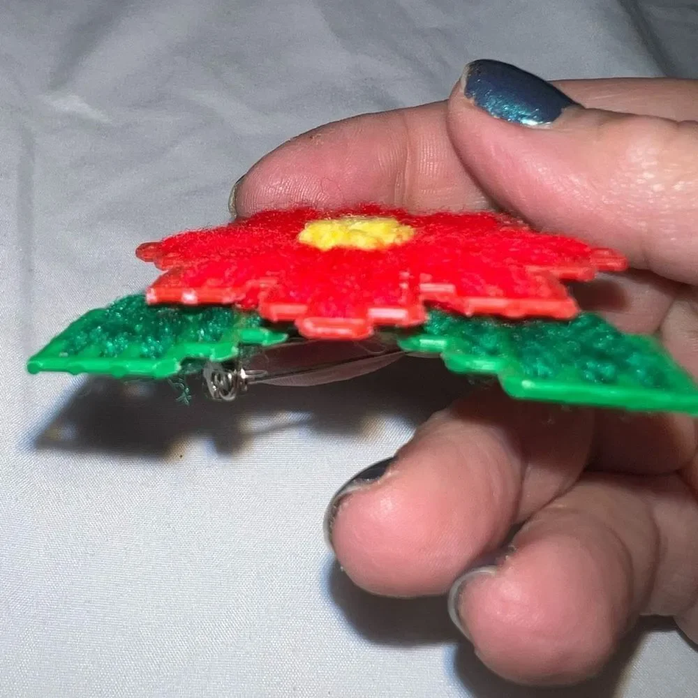 Vintage Handmade Yarn and Plastic Poinsettia Brooch